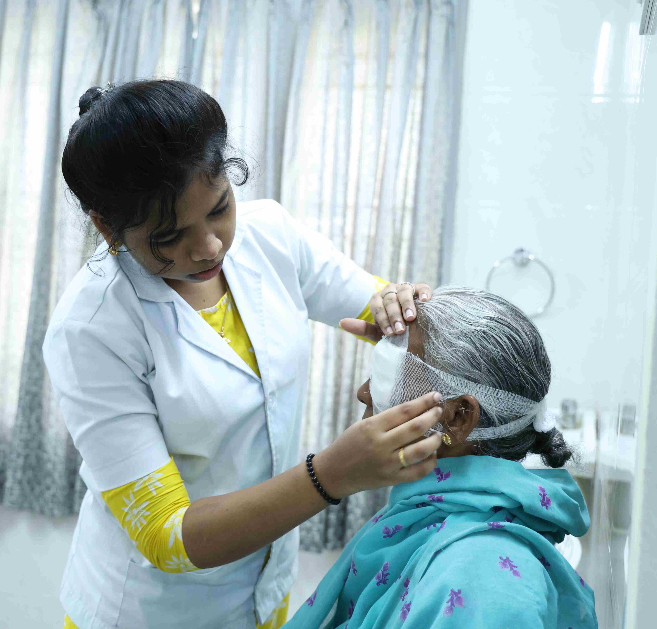 NURSE CARING PATIENT nellai eye care