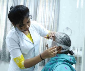 NURSE CARING PATIENT nellai eye care